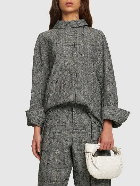 Bottega Veneta   Mini Jodie leather top handle bag 