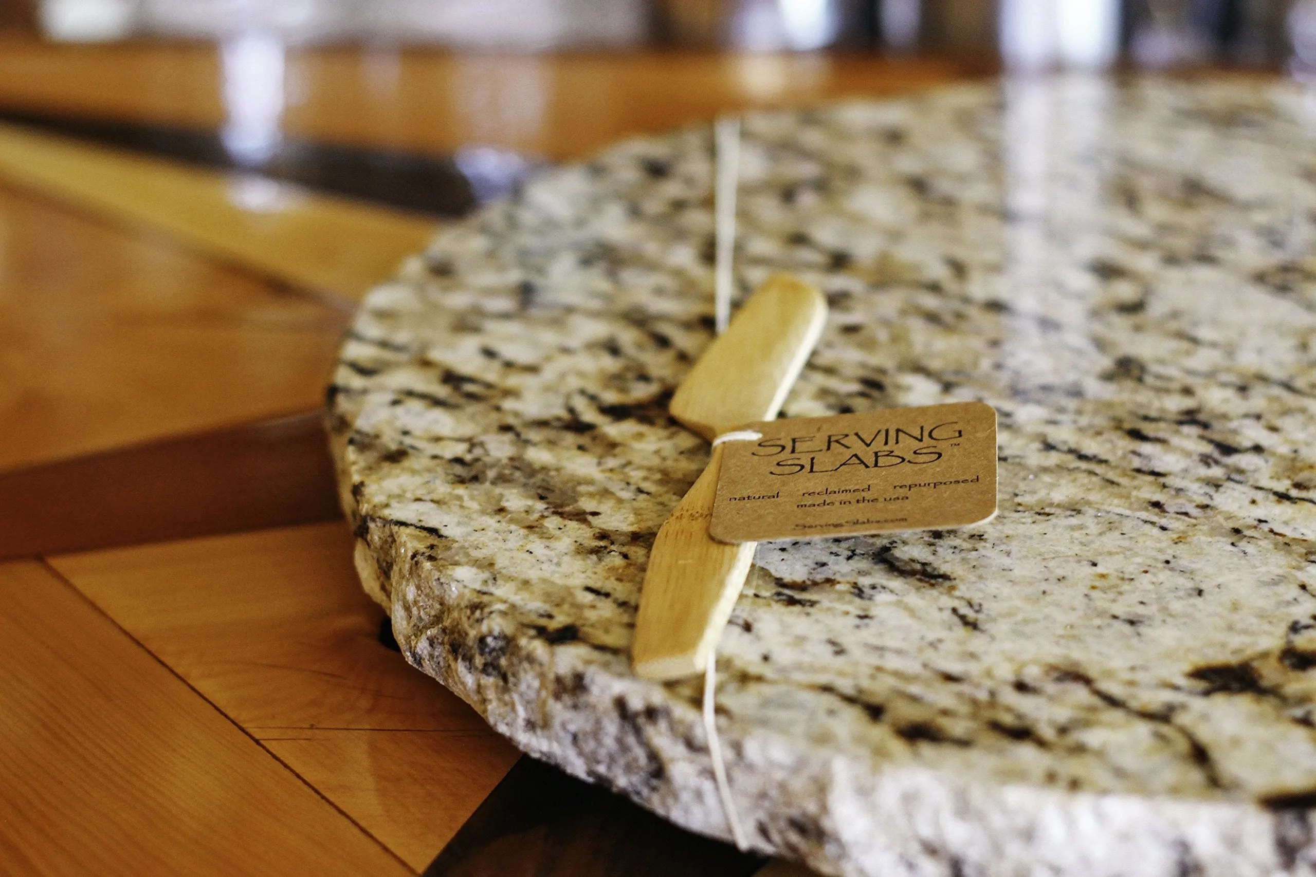Handmade Reclaimed Granite Lazy Susan with Rough Chiseled Edge, 12" Round, Brown